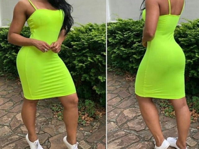 um vestido neon com um sapato branco.