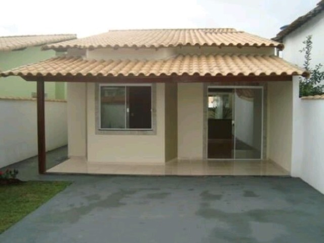 Casa simples com porta de vidro