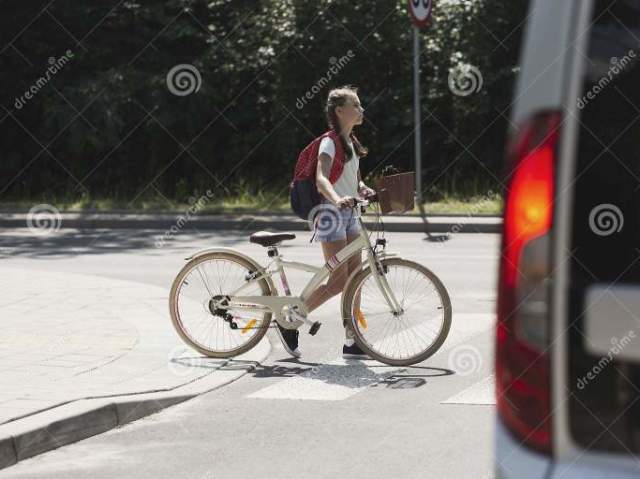 De bicicleta!