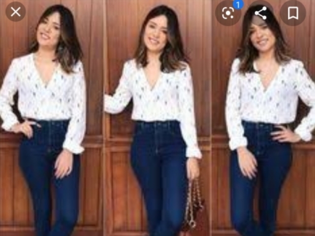 Uma blusa longa e uma calça jeans escura