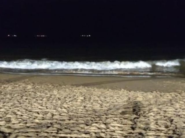 Praia a noite