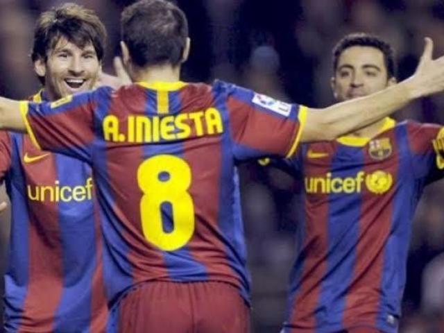 Iniesta,Xavi, Messi