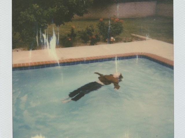 Dead girl in the pool - girl in red
