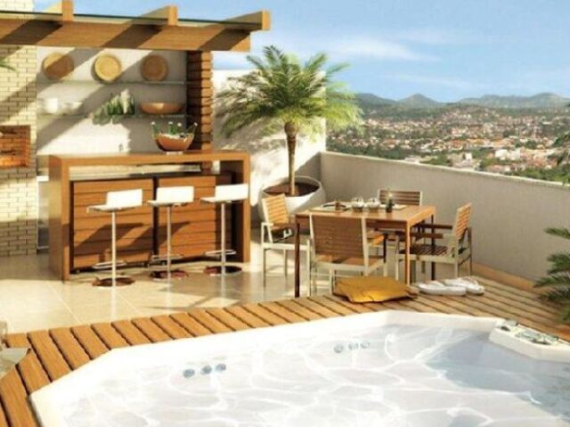 uma area com piscina e churrasqueira particular