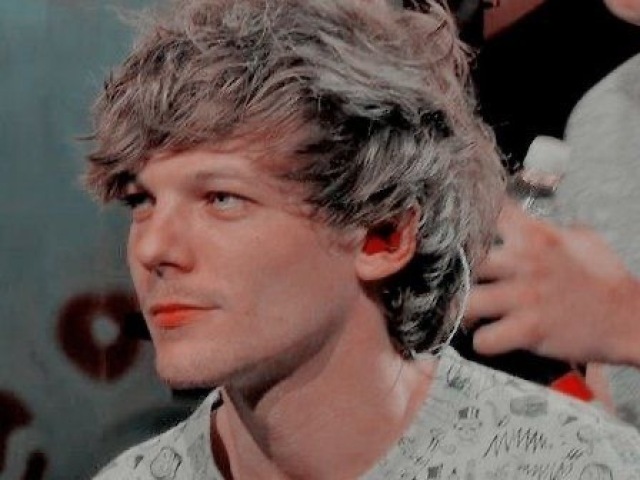 LOUIS TOMLINSON
