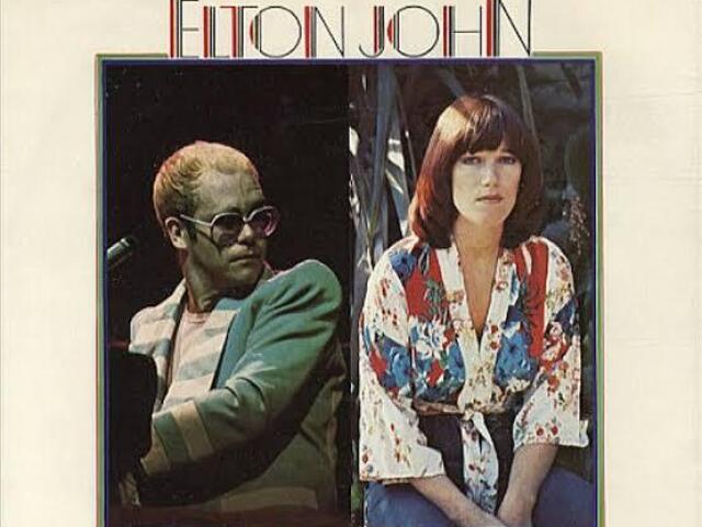 Elton John - Don’t Go Breaking My Heart.