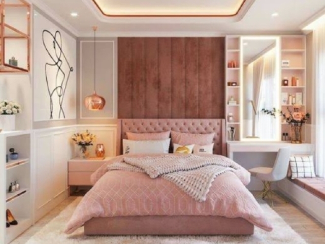 Tons em rosa fechado, um quarto muito elegante e chique.