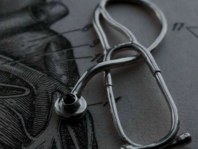 Médico(a)
