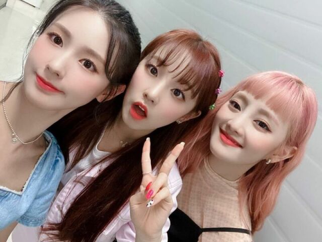 Miyeon, Yuqi e Minnie.