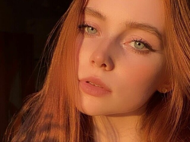 👩🦰🧡