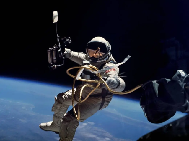 Conduct the first spacewalk